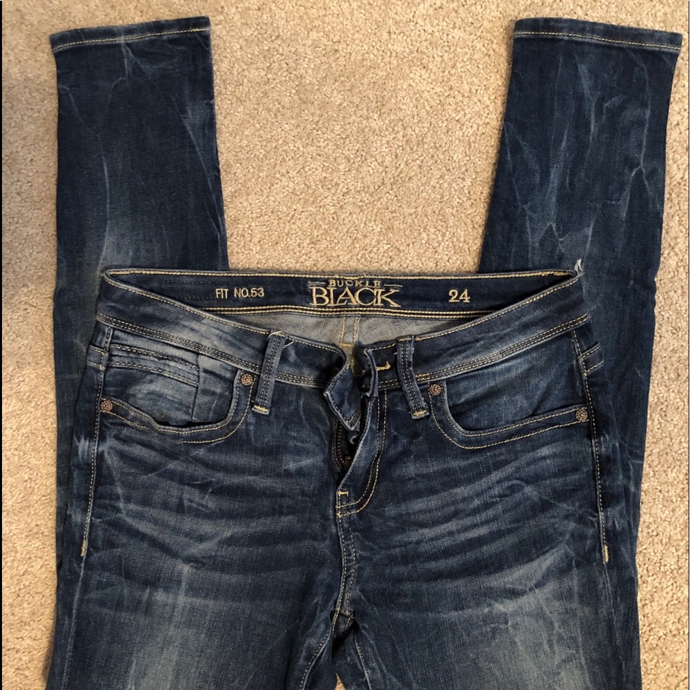 buckle black mid rise skinny jean